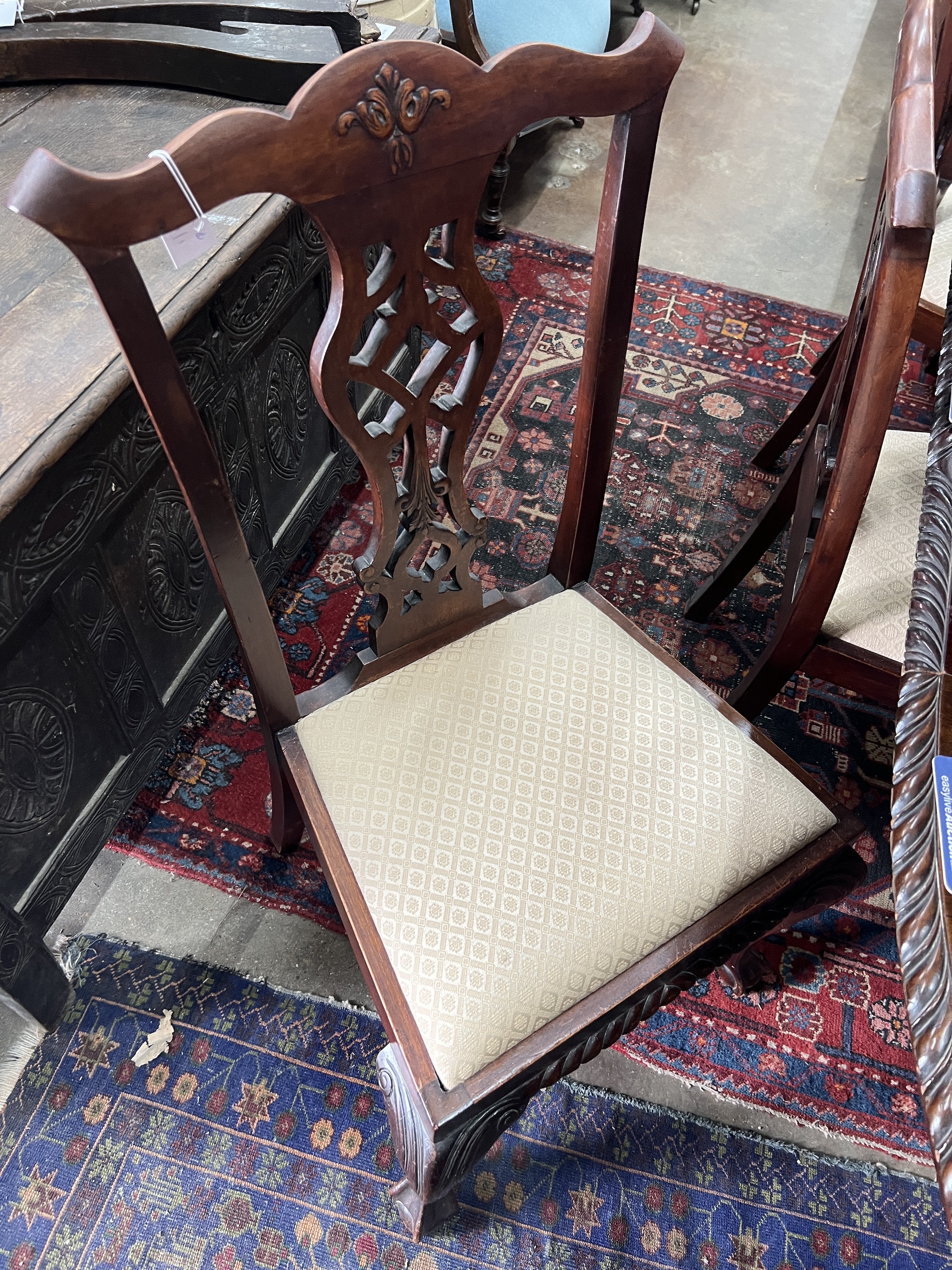 A set of six Chippendale style mahogany dining chairs